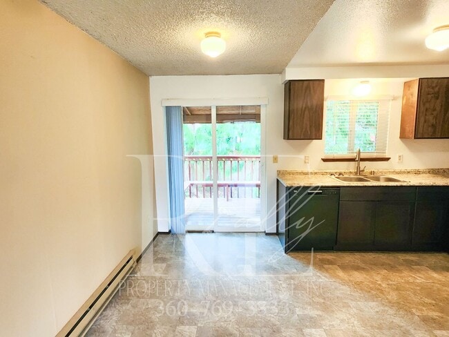 Photo - Spacious Living With Extra Comfort: Bonus Room & Expansive Yard