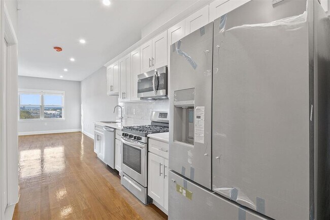 Photo - 311-315-315 West Side Ave Unit 205