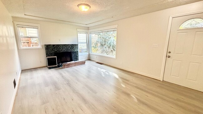Photo - Recently Renovated House With Fenced Back Yard, Attached Garage, and Basement