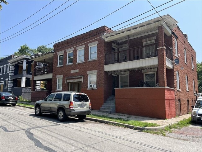 Building Photo - 115 N Askew Ave Unit 1