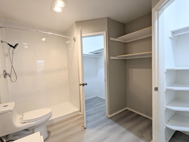 Master Bathroom Dual Walk-In Closets with Motion Sensor Lights - 2522 Corian Glen Dr