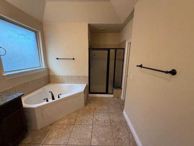 Photo - 3 bedroom + office or 4th bedroom, storm shelter, neighborhood pond and walking track!