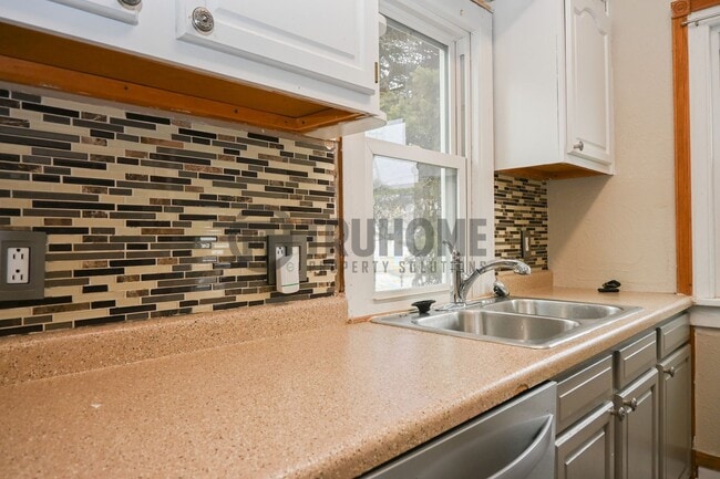 Photo - Large 3 Bedroom 2 Bath House w/Fenced in Yard and 2 Stall Garage Available Soon!