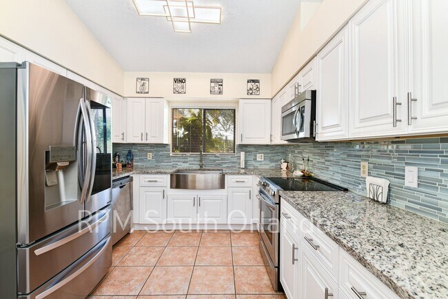 Photo - 4 Bedroom, 2 bathroom, 2 car garage, pool, backyard, close to Universal Studios and International...