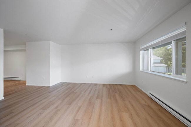 Experience the elegance of contemporary design in this bright, open living area.