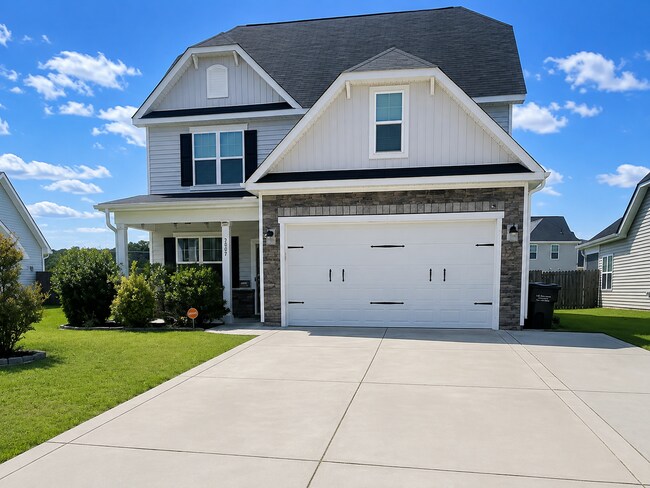 Building Photo - Spacious Elegance Awaits: 4-Bedroom Gem with Granite Countertops on Harrington Road!