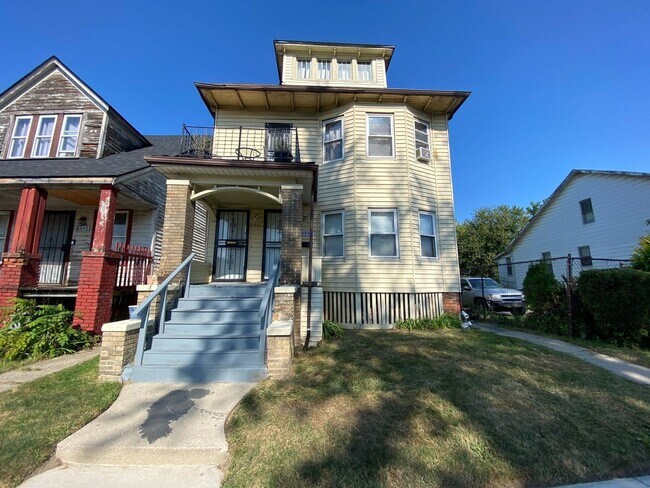Building Photo - 4840 St Clair St Unit Lower Rental