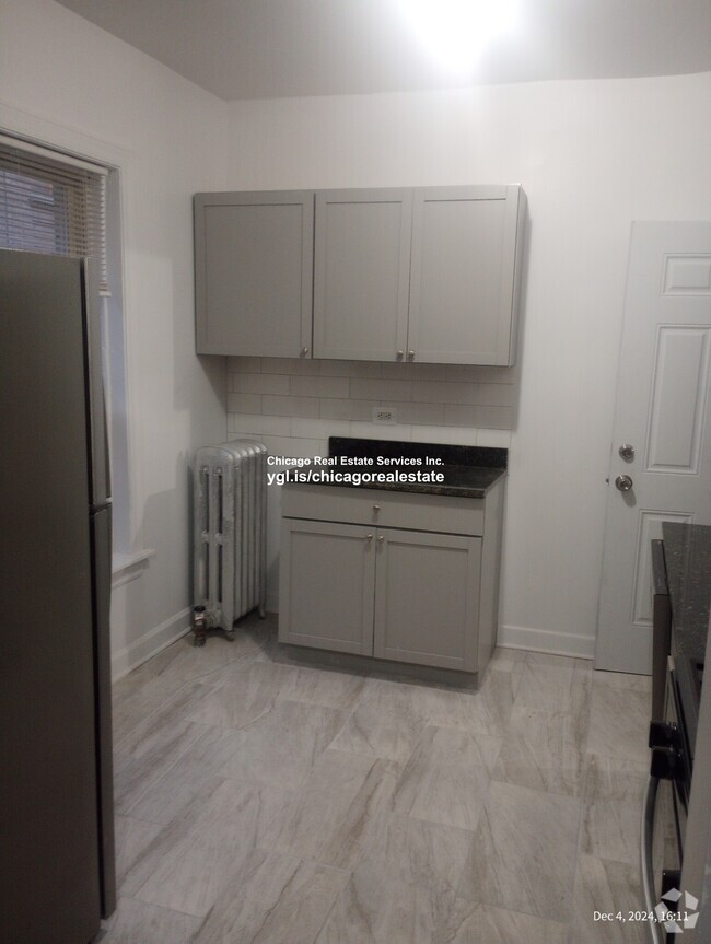 Building Photo - 6345 N Magnolia Ave Unit 2De Rental