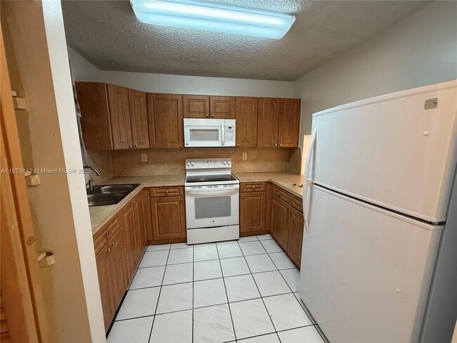 Photo - 2690 W 76th St Unit 102