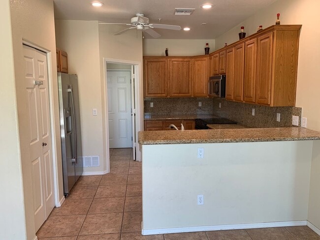 Photo - Spacious 3-Bedroom, 3-Bath Two-Story Home in a Gated Community with Lake Views and Poolside Location