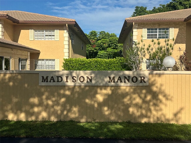 Building Photo - 3034 Coral Springs Dr Unit 202