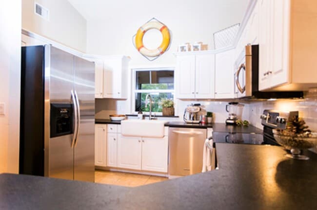 Photo - ANNUAL RENTAL - Beach Cottage with 2 Car Garage 'The Lakehouse' in tropical garden