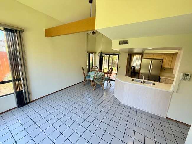 Photo - Private Oasis with Sunroom, Balcony & Lush Landscaping | 4BR Home Near Community Pool & Spa