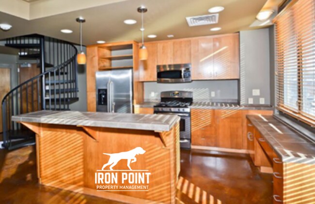 Building Photo - 2399RIVERWALK Unit #201