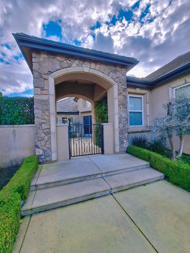 Photo - Custom Clovis Residence in Gated Community | Spacious Layout & 3-Car Garage!