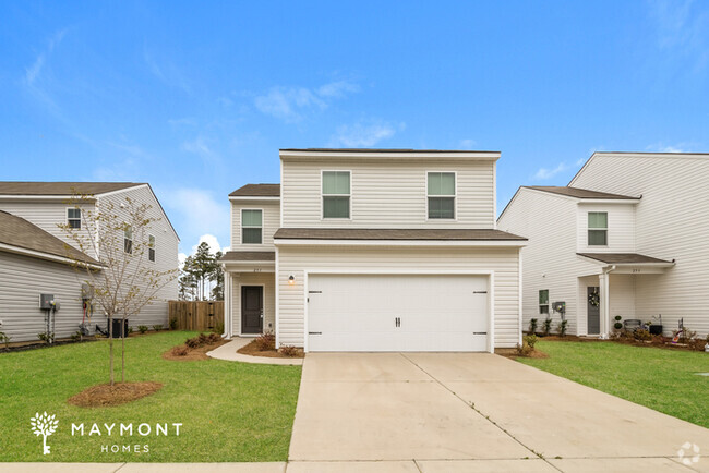 Building Photo - Inviting 4 Bedroom Home