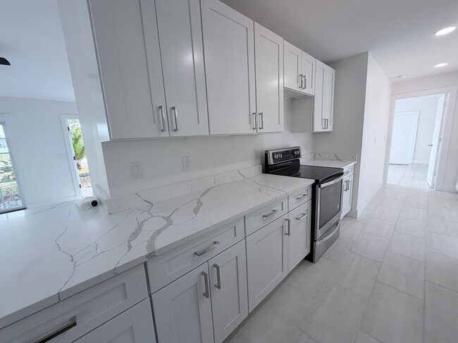 Photo - SECTION 8!!! 3/2 pool home with 2 BONUS ROOMS AVAILABLE 09/01/2026