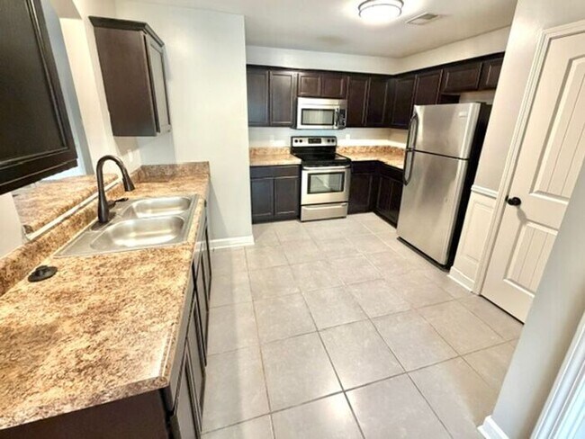 Now Leasing a 4 bedroom 2 bath home in Maywood