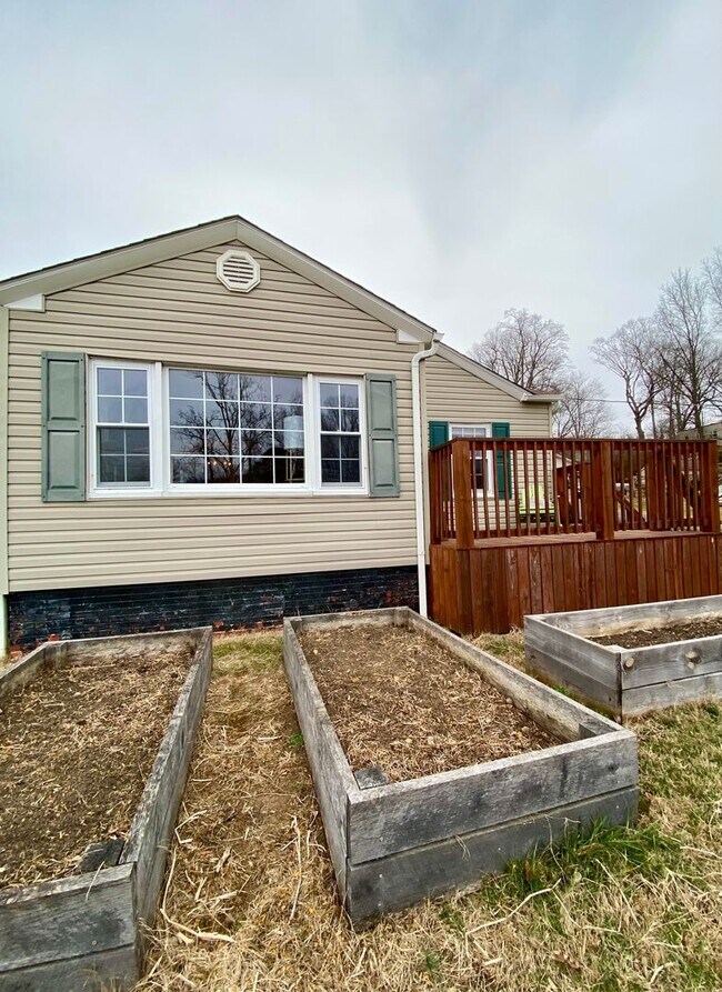 Photo - Spacious 3BR Home Minutes from Downtown Johnson City | W/D Included | Garden Beds