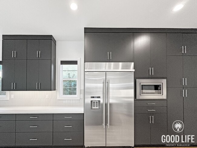 Photo - Luxury 5-Bedroom Home with Walk-In Closets, Modern Kitchen & Community Pool