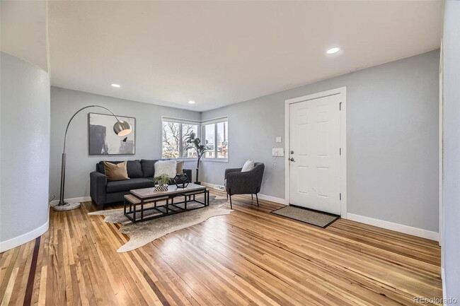 Photo - "Charming 3-Bed SFH Denver Gem with Gleaming Hardwood Floors"