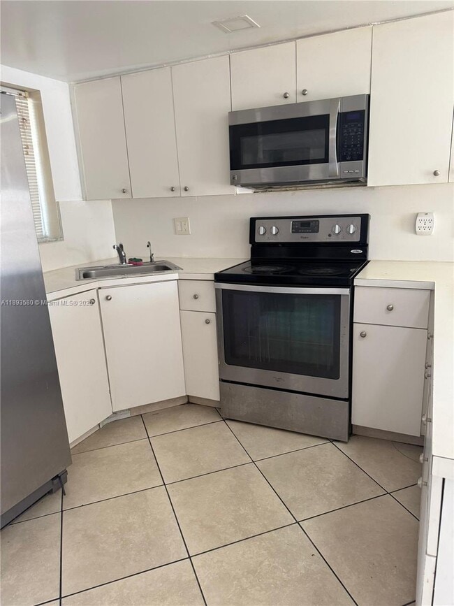 Building Photo - 5530 W 26th Ct Unit 104