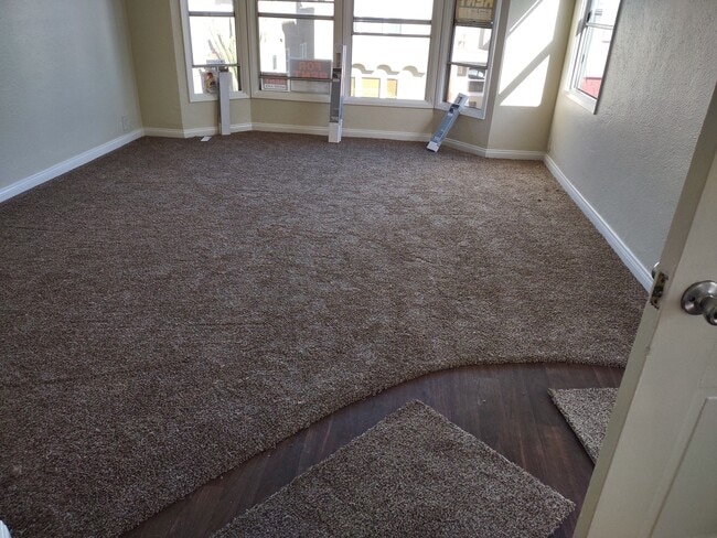 Large Living RM with Bay Windows & New Carpet - 153 Ximeno Ave Unit 153 Ximeno Ave
