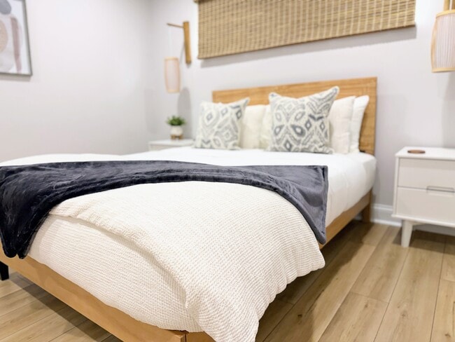 Beautiful, quite queen bedroom with a standing desk, Roku TV, and build in closet. - 7621 Central College Rd