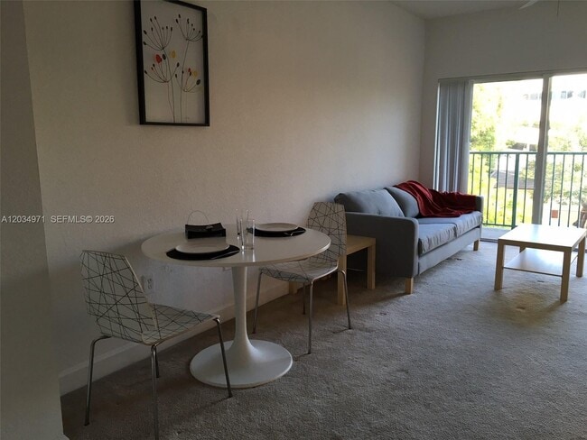 Building Photo - 6001 SW 70th St Unit 335