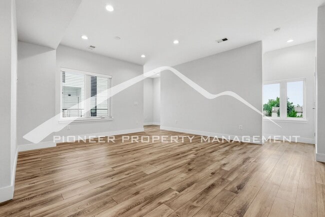 Photo - Spacious Townhouse with Central AC and 2-Car Garage
