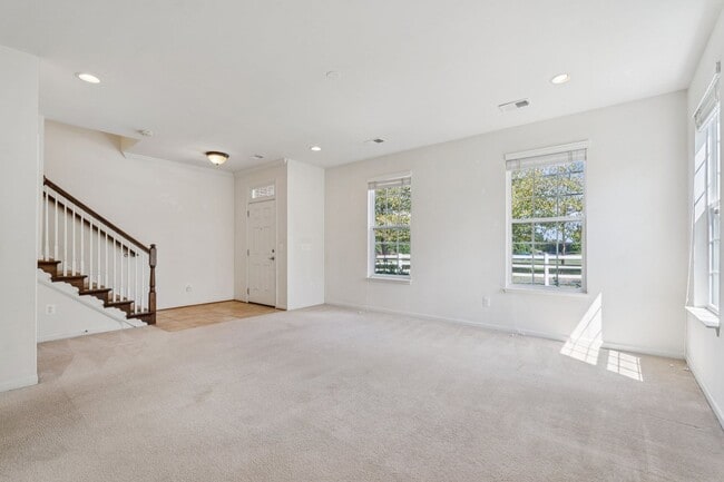 Photo - This beautifully maintained end-unit brick...