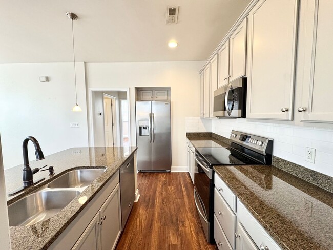 Photo - Stylish 1-Bedroom Corner Unit with Balcony – Minutes from Uptown Charlotte! Only $1,595!