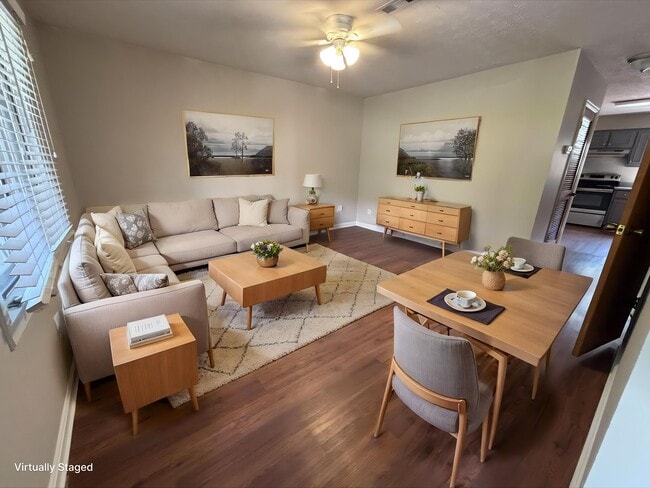Step into the inviting living space at Guest House, featuring modern furnishings and a warm aesthetic. This tranquil atmosphere is perfect for relaxation or entertaining. Don't miss out-schedule a tour today to see it for yourself!