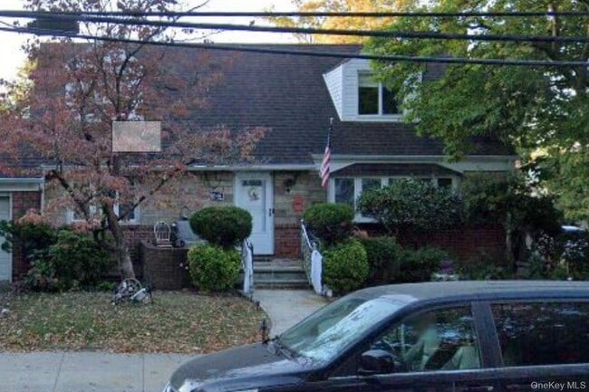 Building Photo - 203-06 53rd Ave Unit 2