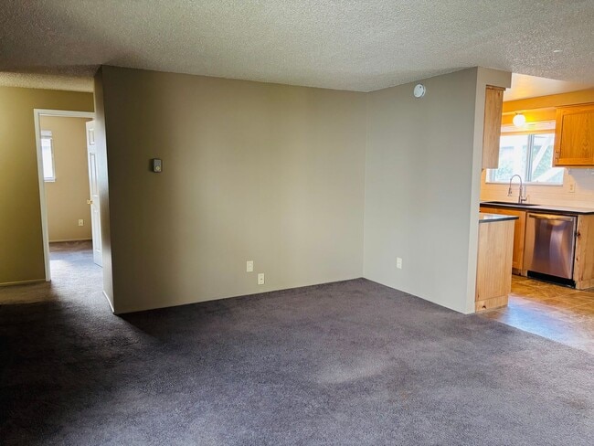 Photo - Bright 2 BR Carter Park Living with Fireplace, Carport, and Tons of Storage!