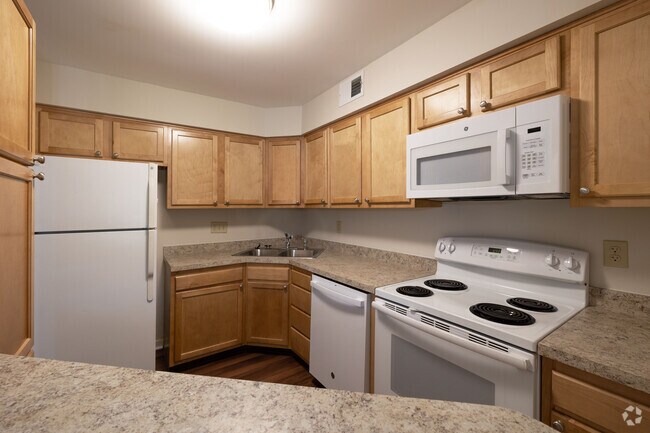 Planta B3 - 2 habitaciones, 1,5 baños - 1049 pies cuadrados - Cocina - Dutch Village Apartments