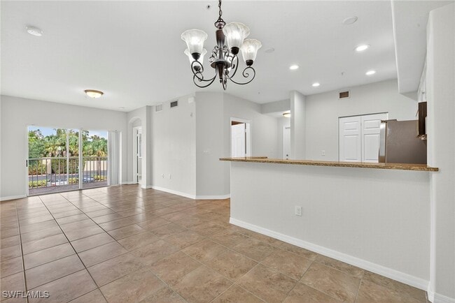 Building Photo - 13150 Bella Casa Cir Unit 2193