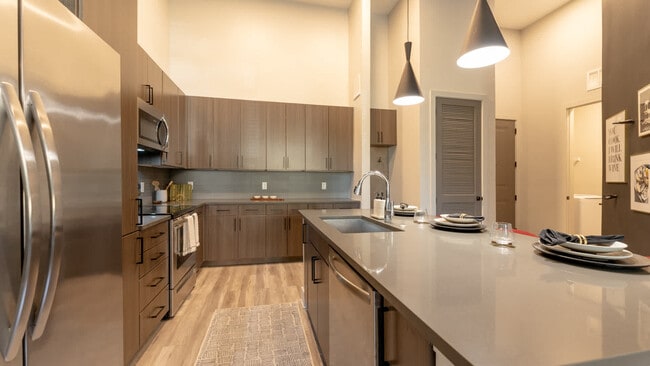 Kitchen with Stainless Steel Appliances and Quartz Countertops