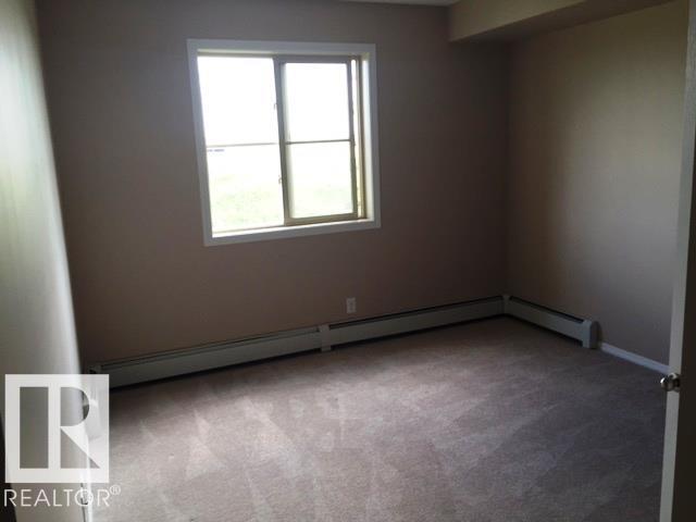 Photo - #206 12035 22 AV SW SW
