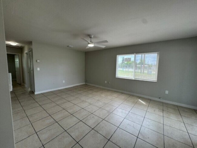 Photo - New Kitchen, Fresh Paint and a Large Screen in Lanai!