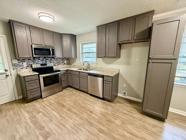 Photo - Comfortable 3-Bed Home with Fenced Backyard