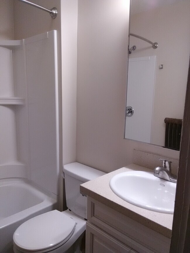 bathroom with new fixtures - 3210 Main St Unit Apartment 1