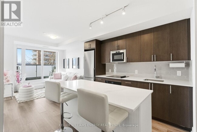 Photo - 2545 Simcoe St N Unité 211