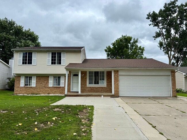 Building Photo - 4-Bedroom Colonial in Grand Blanc – Spacio... Rental