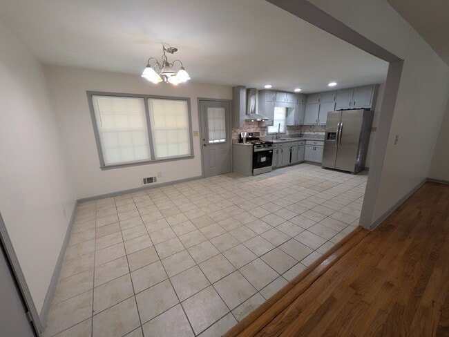 kitchen adjacent to living room - 6082 Walker Rd