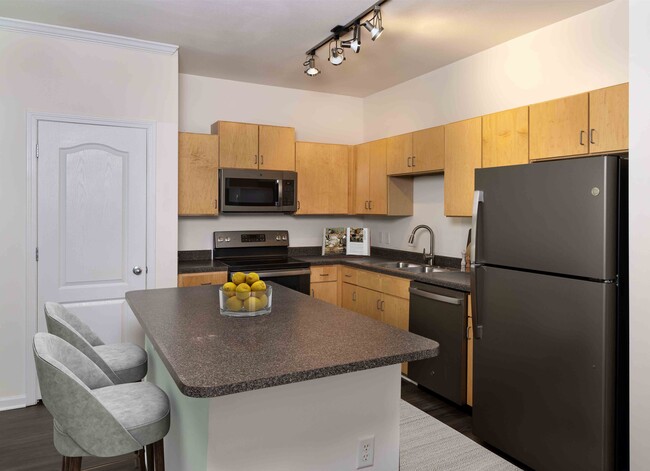Spacious kitchen with slate appliances and large island