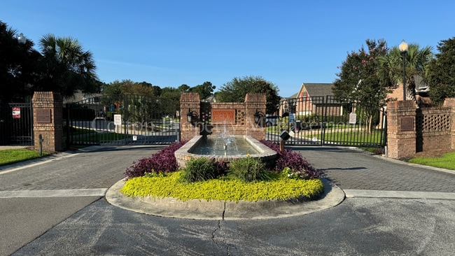 Building Photo - 4BR/3BA Well appointed home in the gated c...