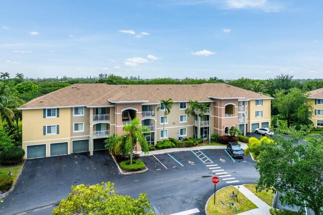 Building Photo - 6492 Emerald Dunes Dr Unit 208