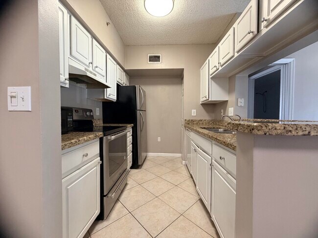 Photo - 11661 W Atlantic Blvd Unidad 1026
