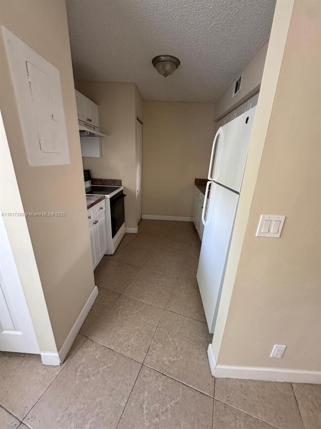 Building Photo - 8630 SW 3rd St Unit 208 Rental